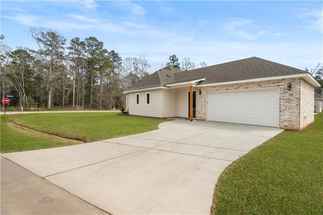 single story home featuring an attached garage, concrete driveway, brick siding, and a front yard