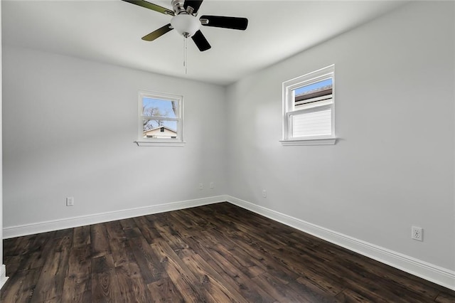 3005 Jasper St, Kenner, LA 70065 - unfurnished room with dark wood-type flooring, ceiling fan, and a healthy amount of sunlight