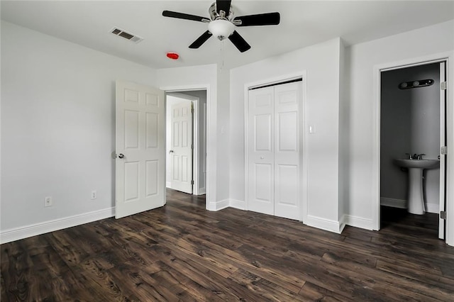 3005 Jasper St, Kenner, LA 70065 - unfurnished bedroom with ceiling fan, dark hardwood / wood-style floors, sink, and a closet