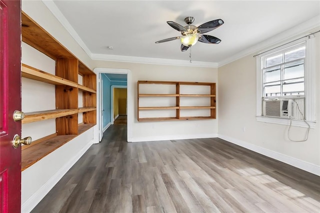 empty room with crown molding, ceiling fan, dark hardwood / wood-style floors, and cooling unit