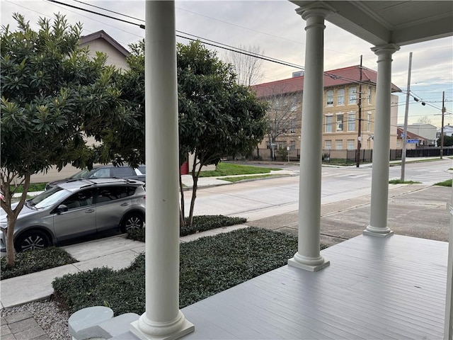 exterior space featuring ornate columns