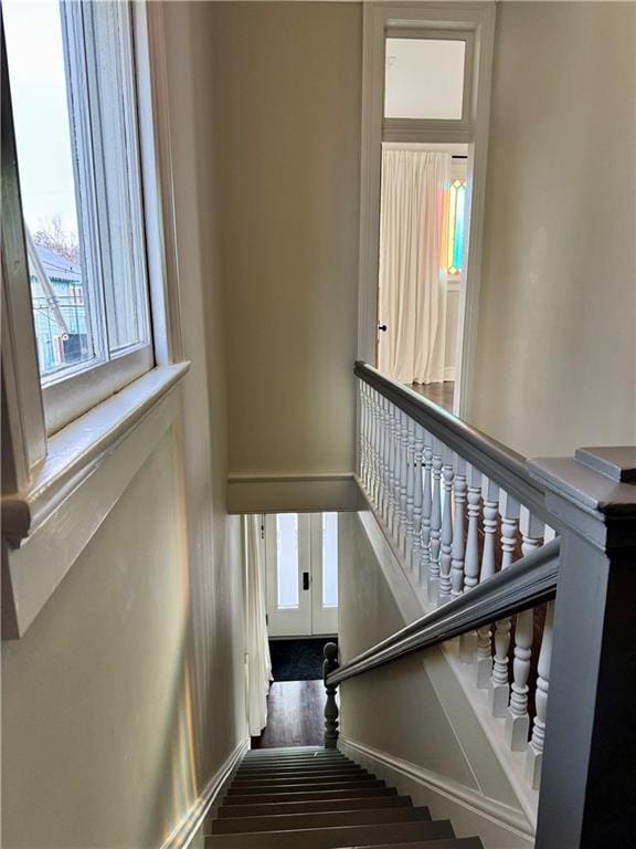 stairs with wood finished floors