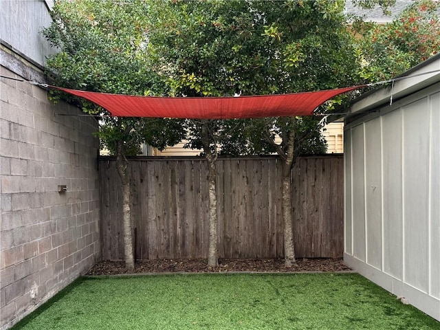 view of yard featuring fence