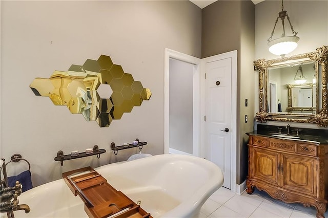 bathroom with vanity, a bath, and tile patterned flooring