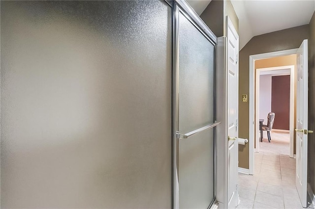 bathroom featuring tile patterned floors and walk in shower
