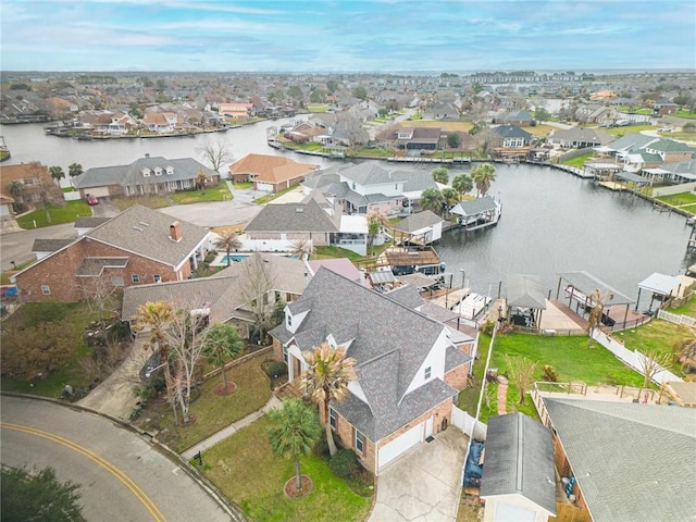 drone / aerial view with a water view