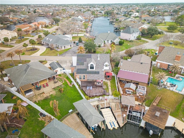 drone / aerial view with a water view