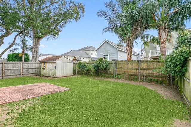 22830 22nd St, New Orleans, LA 70124 - view of yard featuring a patio and a storage shed
