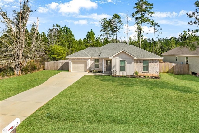 ranch-style house featuring a garage and a front yard