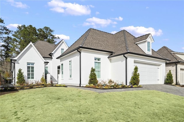 view of property exterior featuring a garage and a yard