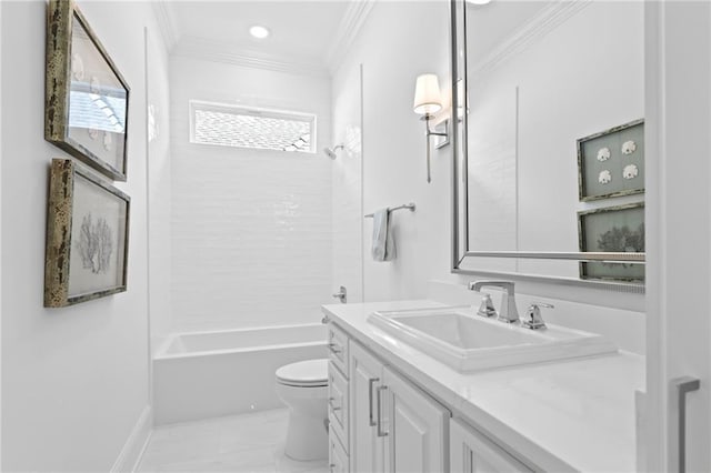 full bathroom with crown molding, tiled shower / bath, vanity, and toilet