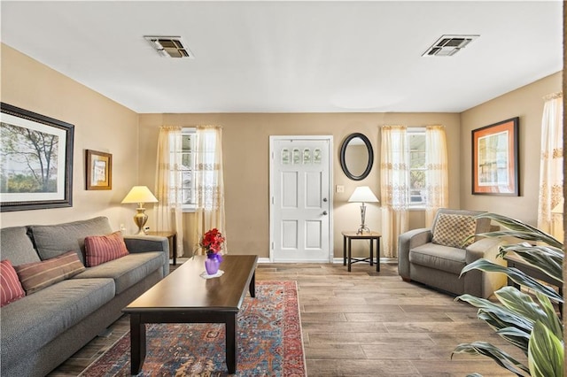 living room with light hardwood / wood-style floors