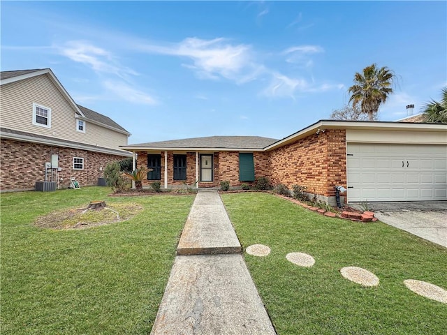 view of front of house with a garage and a front yard