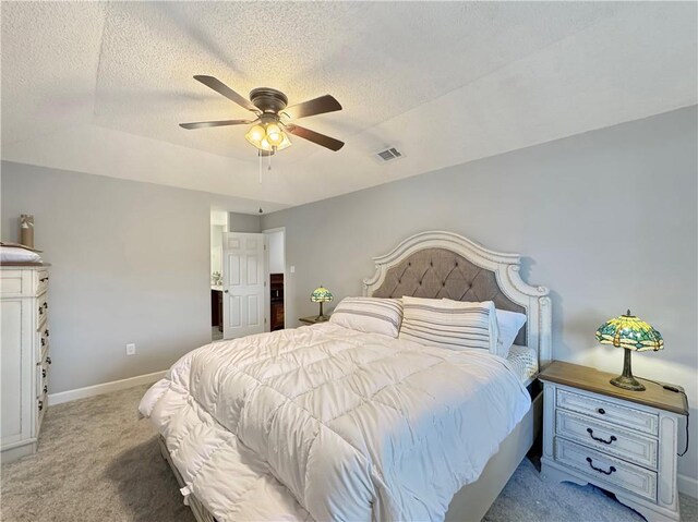 102 Chubasco Ln, Slidell, LA 70458 - carpeted bedroom with baseboards, a textured ceiling, and ceiling fan