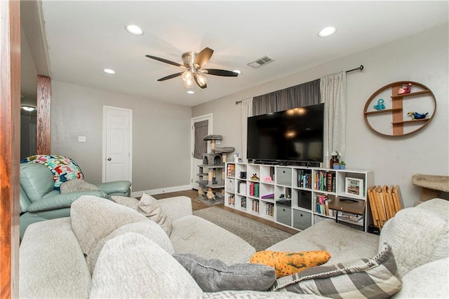 living room with ceiling fan