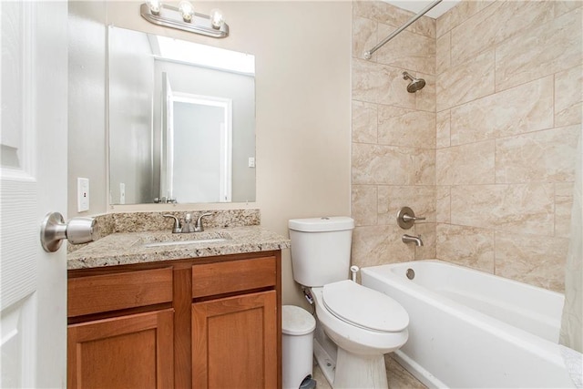 full bathroom with vanity, shower / tub combo, and toilet