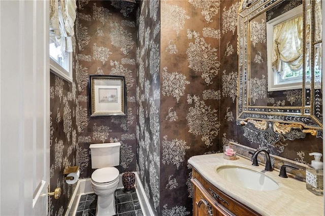 180 E Oakridge Park, Metairie, LA 70005 - bathroom with tile patterned floors, vanity, and toilet
