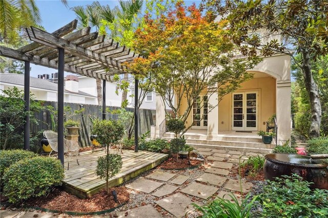 180 E Oakridge Park, Metairie, LA 70005 - view of patio / terrace with a wooden deck, a pergola, and french doors
