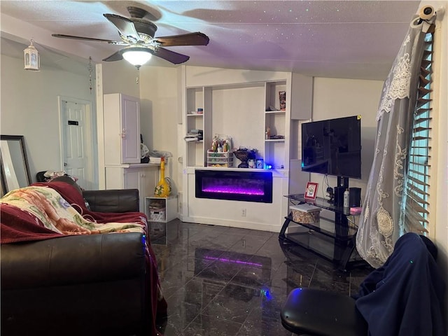 living area featuring ceiling fan