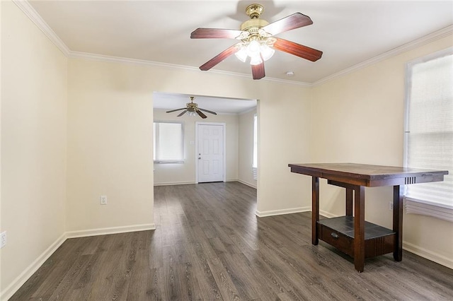 empty room with ornamental molding and dark hardwood / wood-style floors