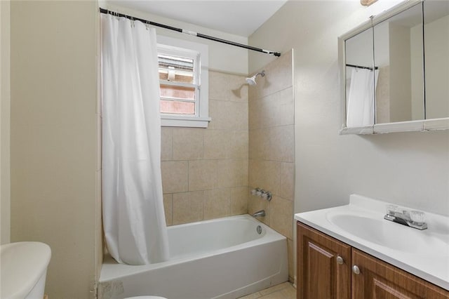 full bathroom with shower / bath combination with curtain, vanity, and toilet