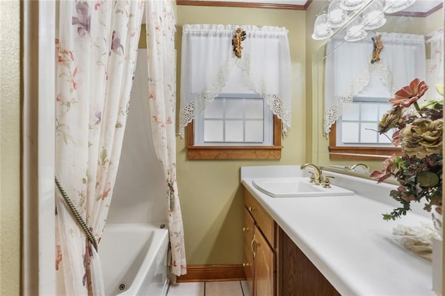 bathroom with shower / tub combo with curtain, vanity, and tile patterned floors