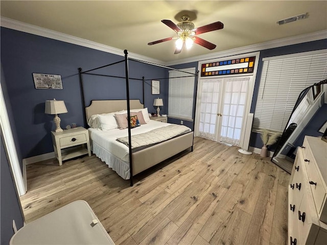 bedroom featuring crown molding, ceiling fan, and light hardwood / wood-style floors