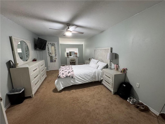 bedroom with light carpet and ceiling fan