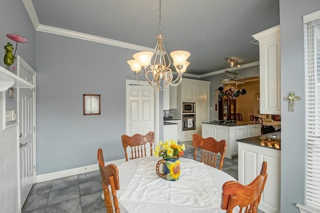 dining room with crown molding and an inviting chandelier