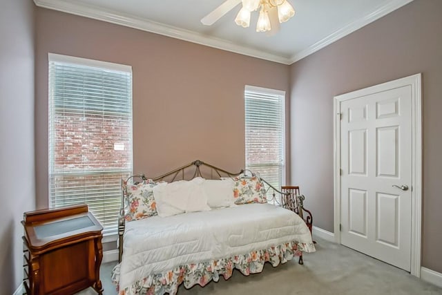 bedroom featuring crown molding and light carpet