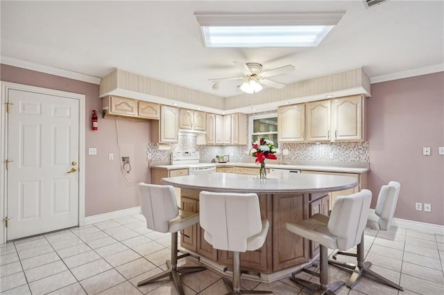 kitchen featuring light tile patterned floors, tasteful backsplash, ornamental molding, and range