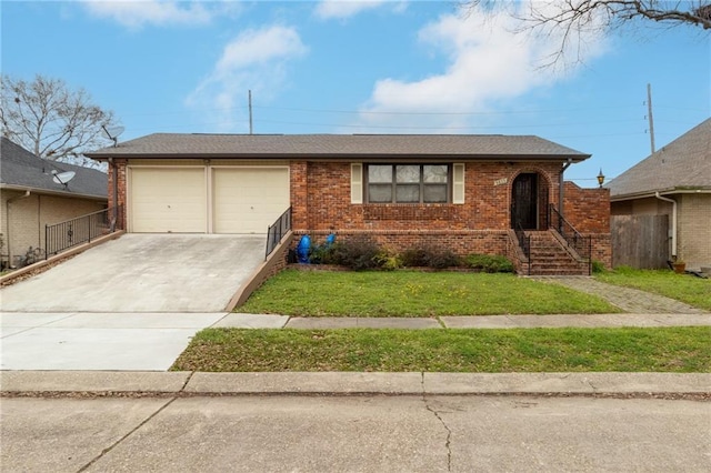 single story home featuring a garage and a front lawn