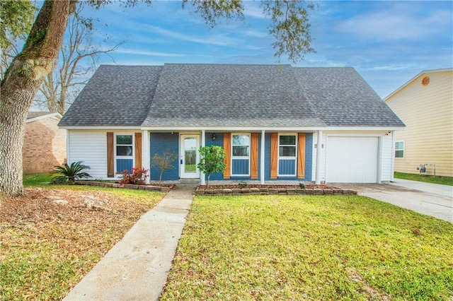 view of front of house featuring a porch, a garage, and a front yard