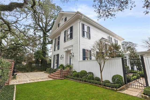 view of front of house with a front lawn