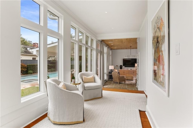 sunroom / solarium with a wealth of natural light