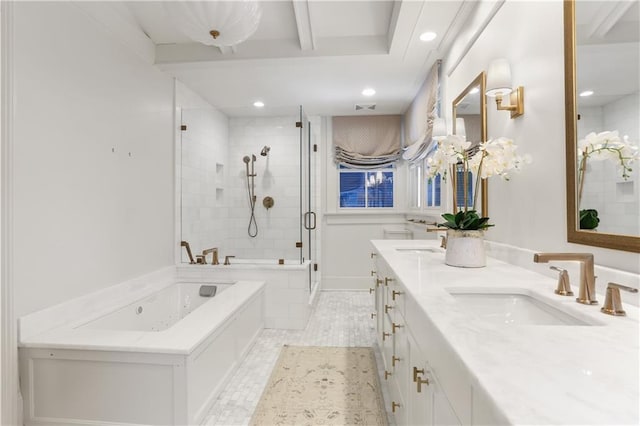 bathroom featuring vanity and plus walk in shower