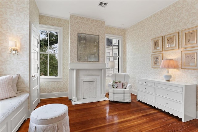 sitting room with dark hardwood / wood-style floors