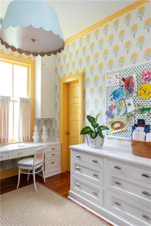 kitchen with white cabinetry and light wood-type flooring