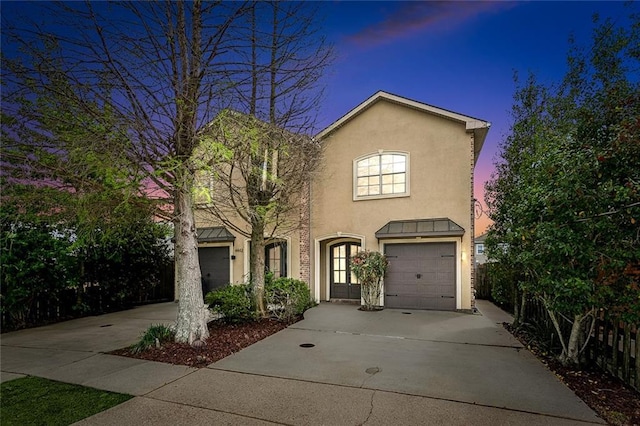 view of front of house with a garage