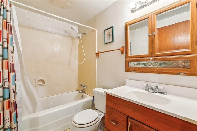 full bathroom featuring vanity, toilet, and shower / bath combo with shower curtain