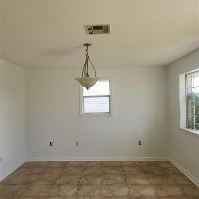 2404 Francis Ave, Violet, LA 70092 - spare room with baseboards