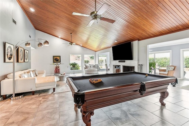 game room featuring light tile patterned flooring, visible vents, a fireplace, and wood ceiling