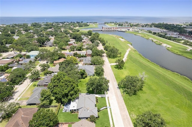 birds eye view of property featuring a residential view and a water view