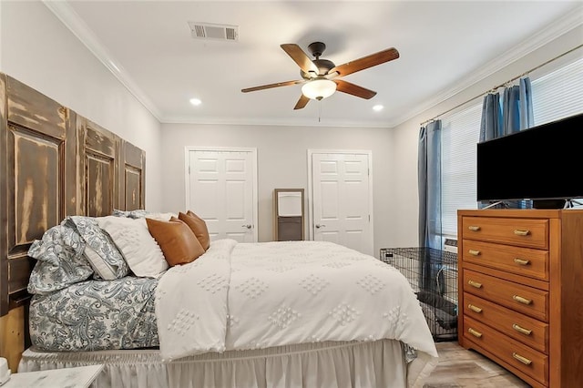 bedroom with a ceiling fan, recessed lighting, visible vents, and crown molding