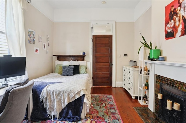 bedroom featuring dark hardwood / wood-style floors