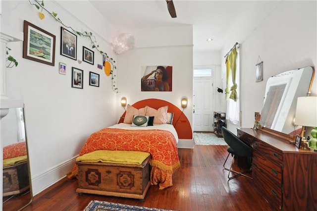 bedroom featuring dark hardwood / wood-style flooring