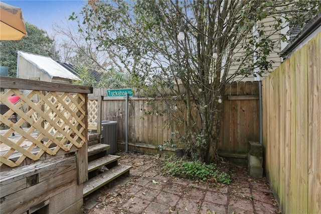 view of yard with central AC unit