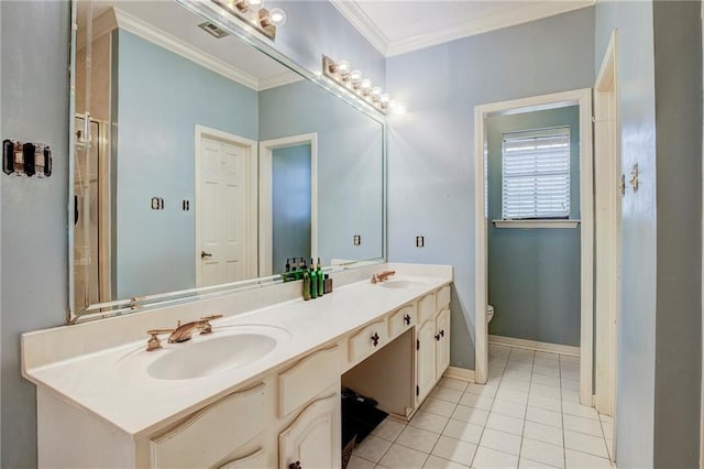 bathroom featuring vanity, ornamental molding, a shower with shower door, tile patterned floors, and toilet