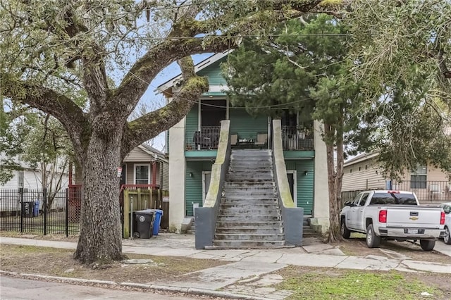2226 Saint Bernard Ave, New Orleans, LA 70119 - view of front of home with stairway and covered porch