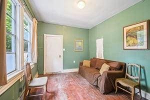 2226 Saint Bernard Ave, New Orleans, LA 70119 - living room featuring baseboards